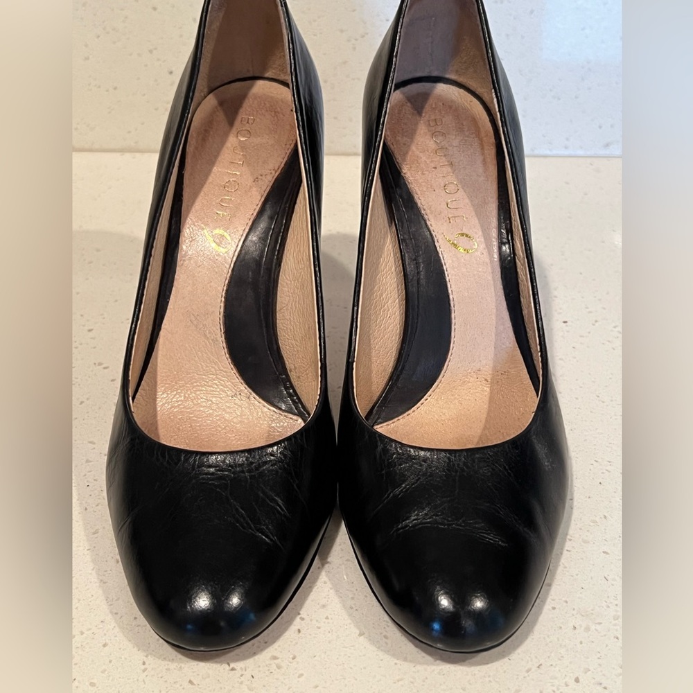 Boutique black leather high heels